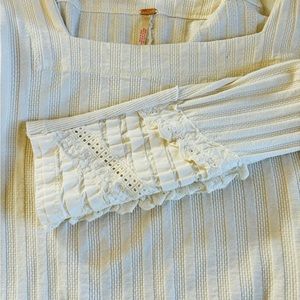 Free People top.detailed sleeves. Purchase at Nordstrom, washed/never worn
